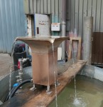 Water testing the raw bronze fountain